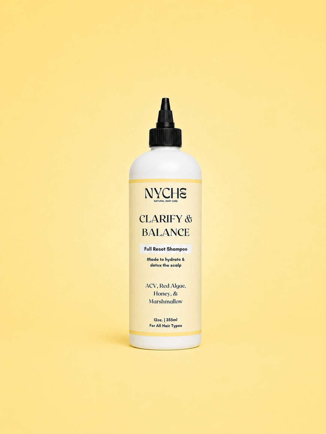 Clarify & Balance shampoo bottle with black pump, jumbo size