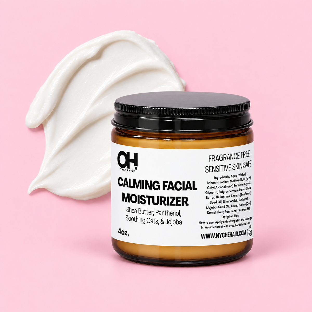 Calming facial moisturizer jar with cream scoop behind, black lid and amber jar