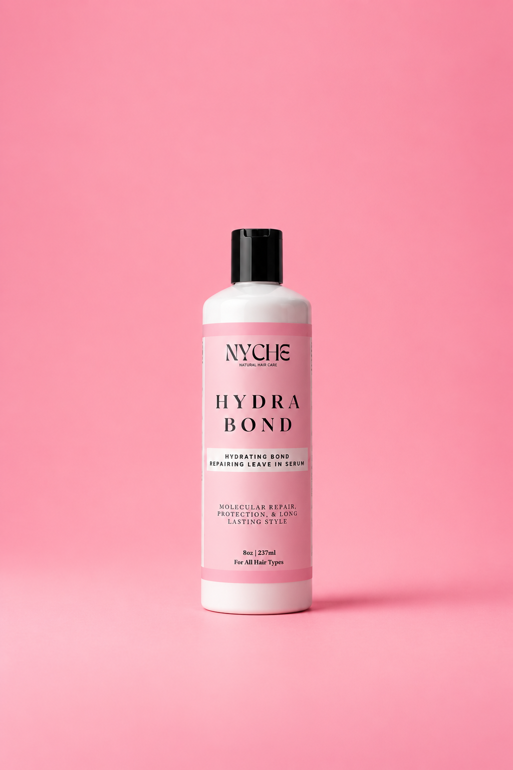 NYCHE Hydra Bond repairing serum bottle with pump cap, pink liquid