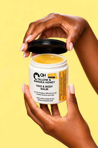 Face and body balm jar with yellow tallow-manuka honey balm, held by two hands