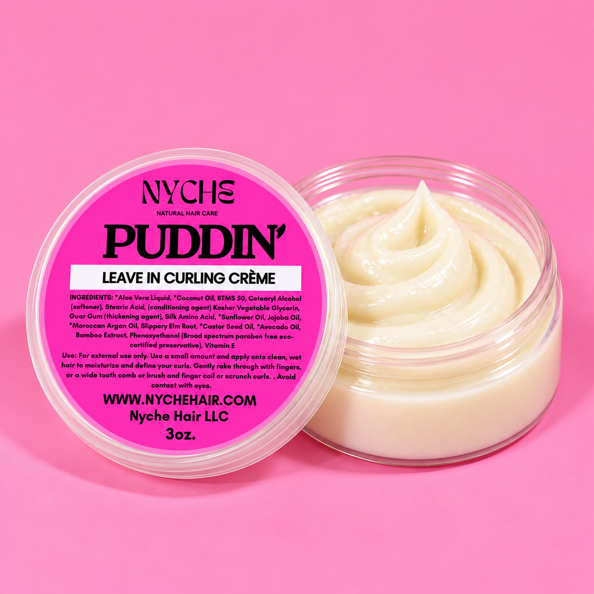 Curl defining crème in open 3 oz jar with pink label and matching lid